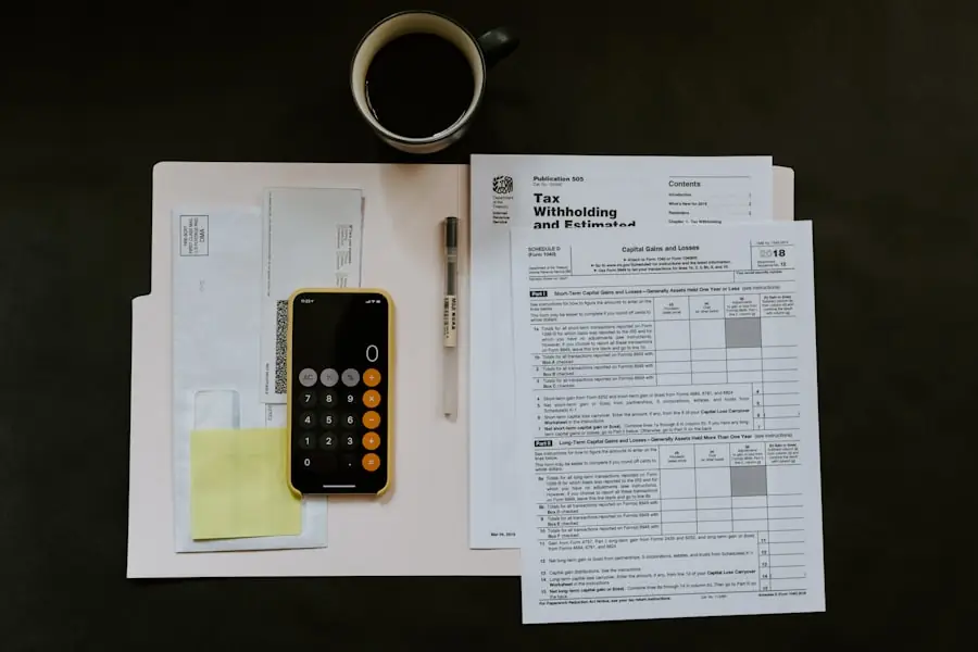 A person working through finances with a calculator and documents to assess borrowing power