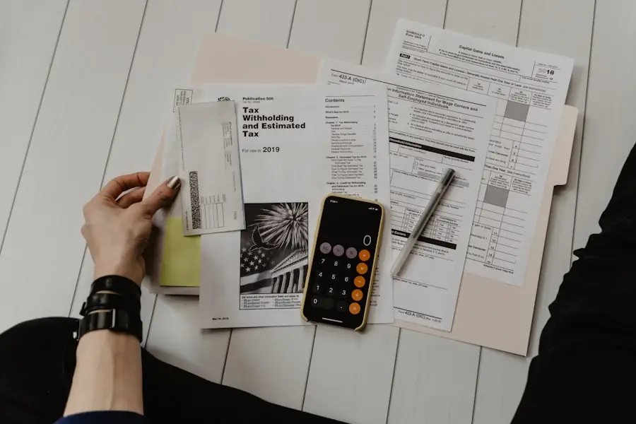 A person signing home loan paperwork with a pen