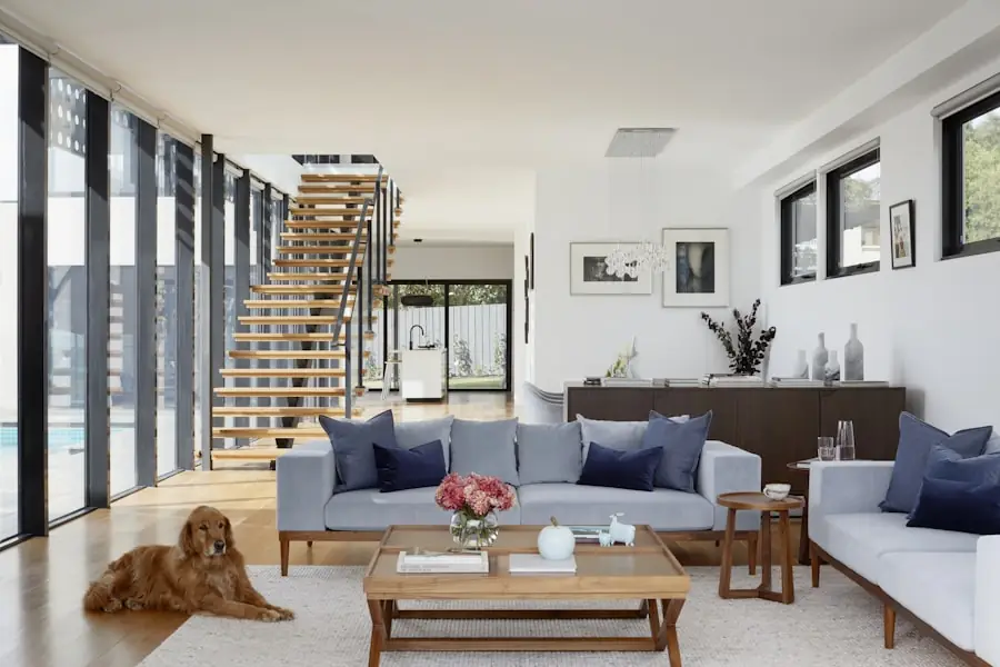 A warm, modern living room in a bright new home
